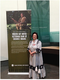UKB Museum Director Ernestine Berry stands beside the History of the United Keetoowah Band Panel at the National Museum of the American Indian. UKB Museum Director Ernestine Berry stands beside the History of the United Keetoowah Band Panel at the National Museum of the American Indian.